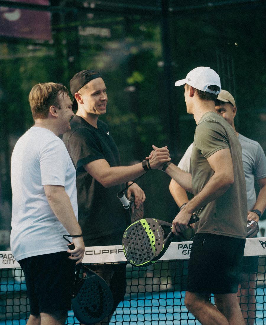 Players shaking hands at the net